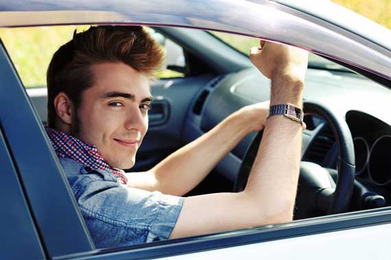 Smiling male passed the driving test